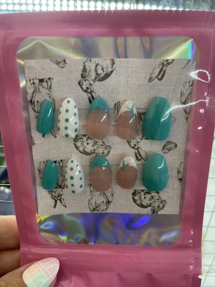 Teal press-on nails with polka dot accent nails